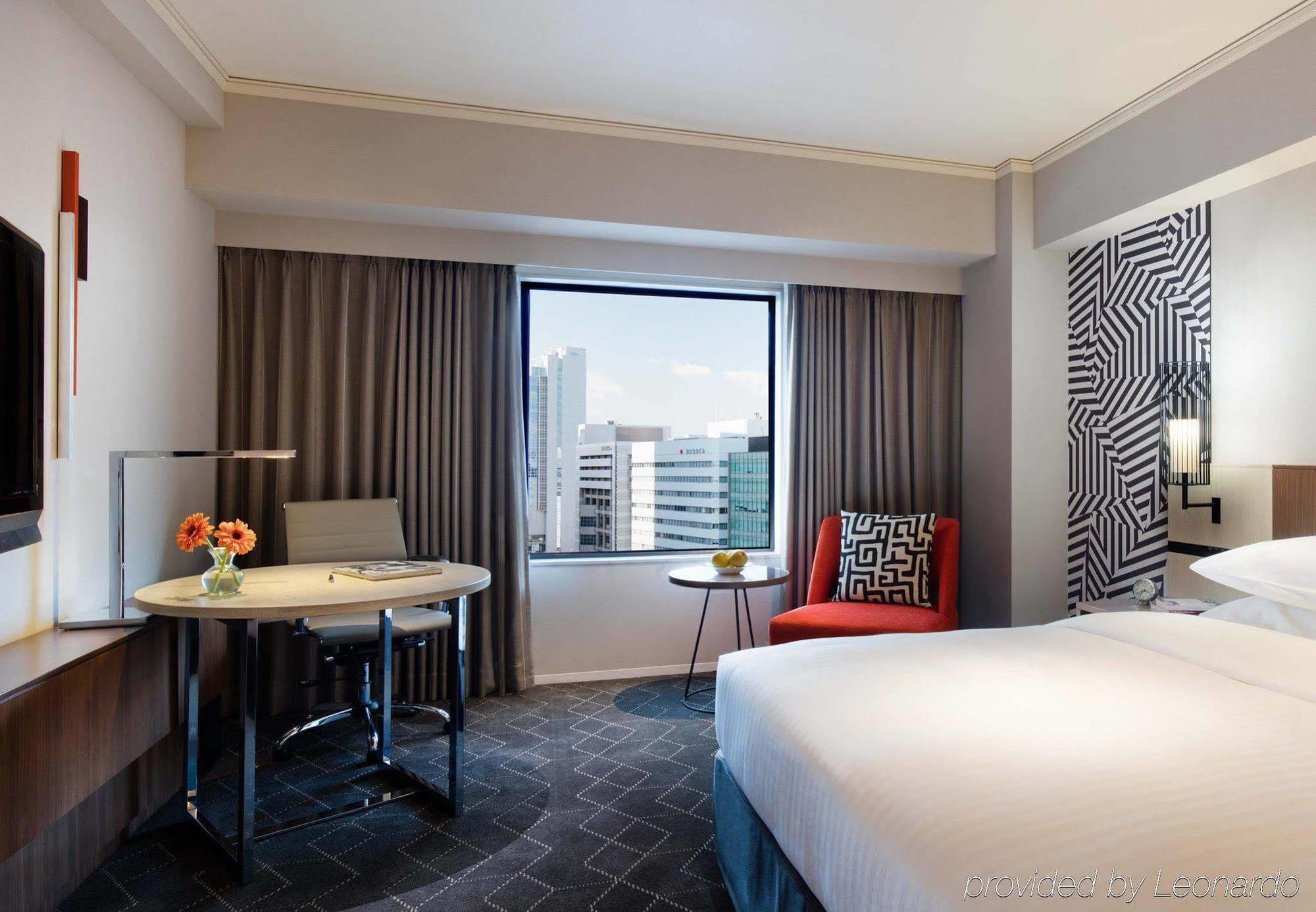 Hotel Courtyard By Marriott Shin-Osaka Station Zewnętrze zdjęcie A guest room at the hotel